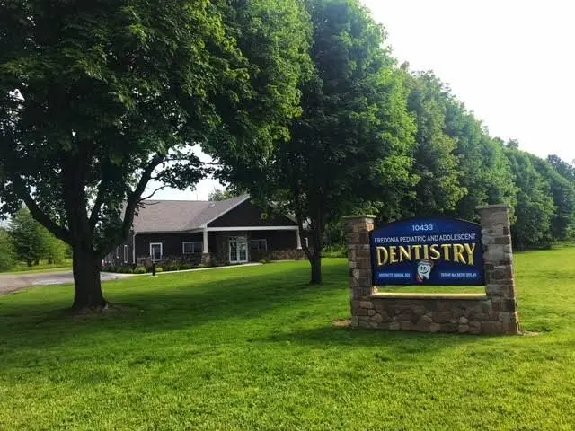 Fredonia Pediatric & Adolescent Dentistry - Professional dental clinic exterior with modern facilities