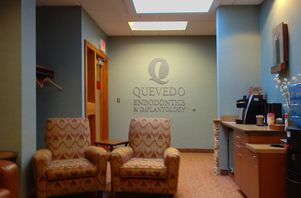 Quevedo Endodontics & Implantology - Professional dental clinic exterior with modern facilities