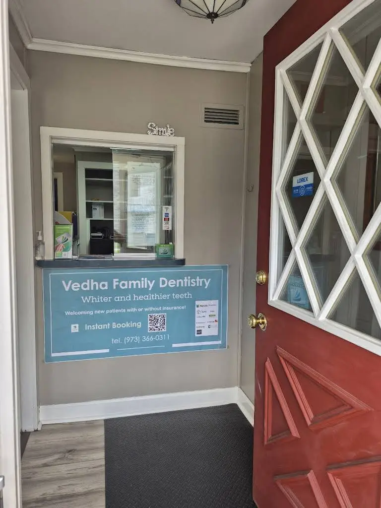 Vedha Family Dentistry - Professional dental clinic exterior with modern facilities