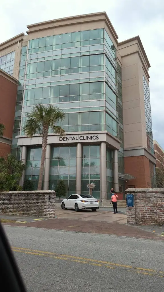 College of Dental Medicine Clinics - Professional dental clinic exterior with modern facilities