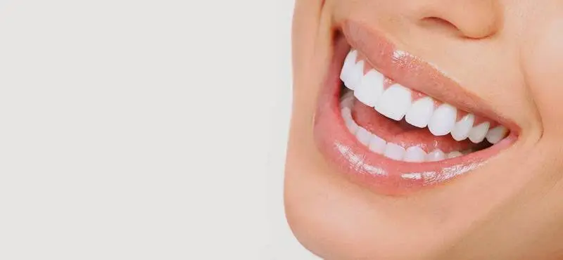 DentaLux LLC - Professional dental clinic exterior with modern facilities
