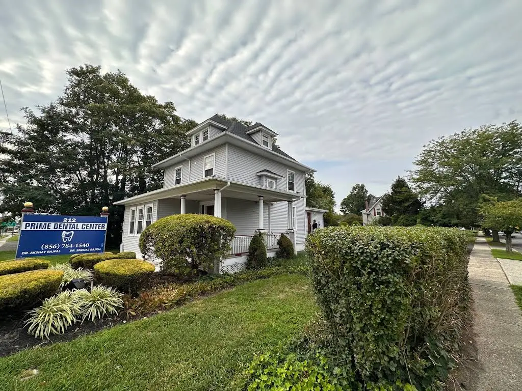 Prime Dental Center - Professional dental clinic exterior with modern facilities