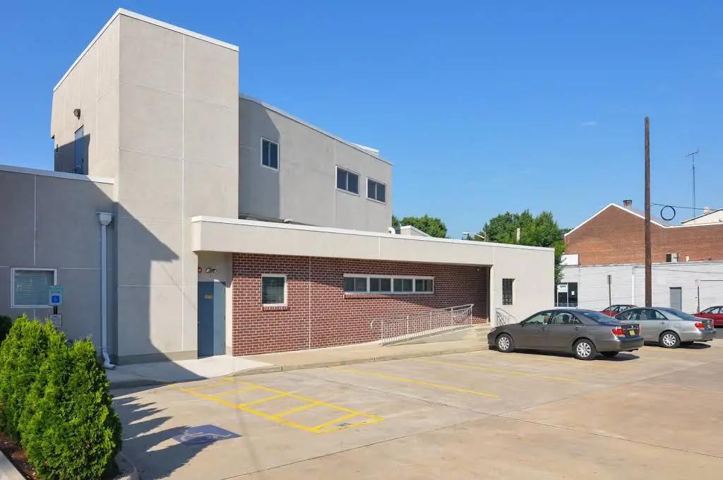1100 DENTAL - Professional dental clinic exterior with modern facilities