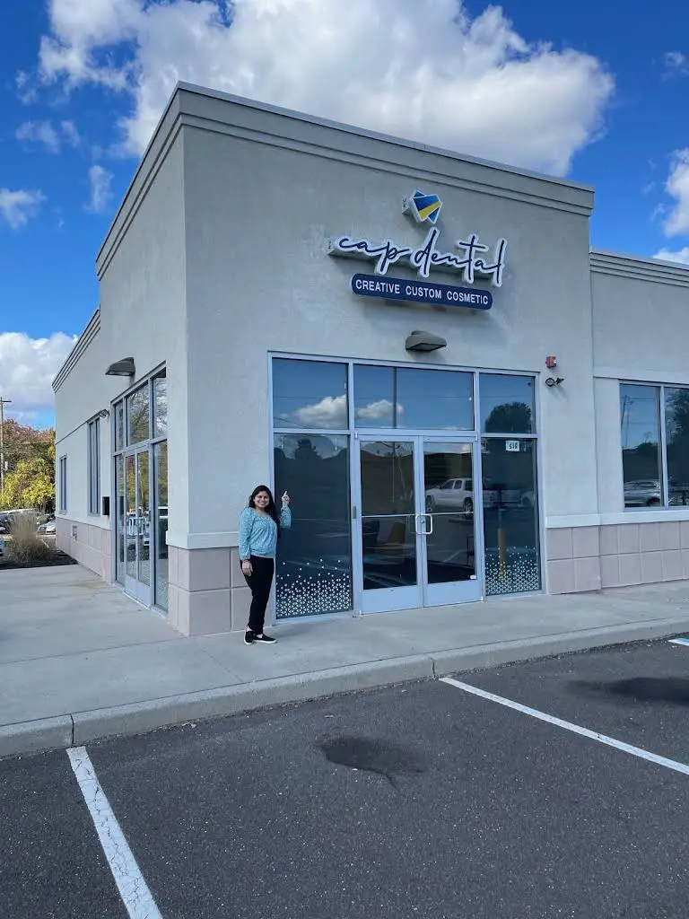 Universal Dentistry - Professional dental clinic exterior with modern facilities