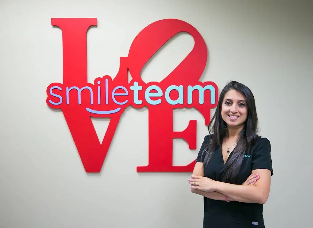 Smile Team - Professional dental clinic exterior with modern facilities