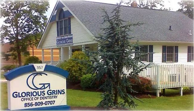 Glorious Grins Office Of Dentistry - Professional dental clinic exterior with modern facilities