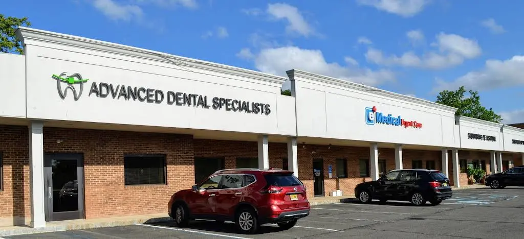 Advanced Dental Specialists - Professional dental clinic exterior with modern facilities