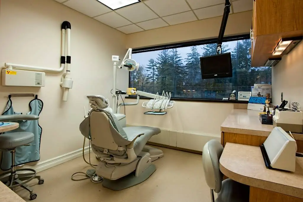 NJDC for Implant & Cosmetic Dentistry - Professional dental clinic exterior with modern facilities