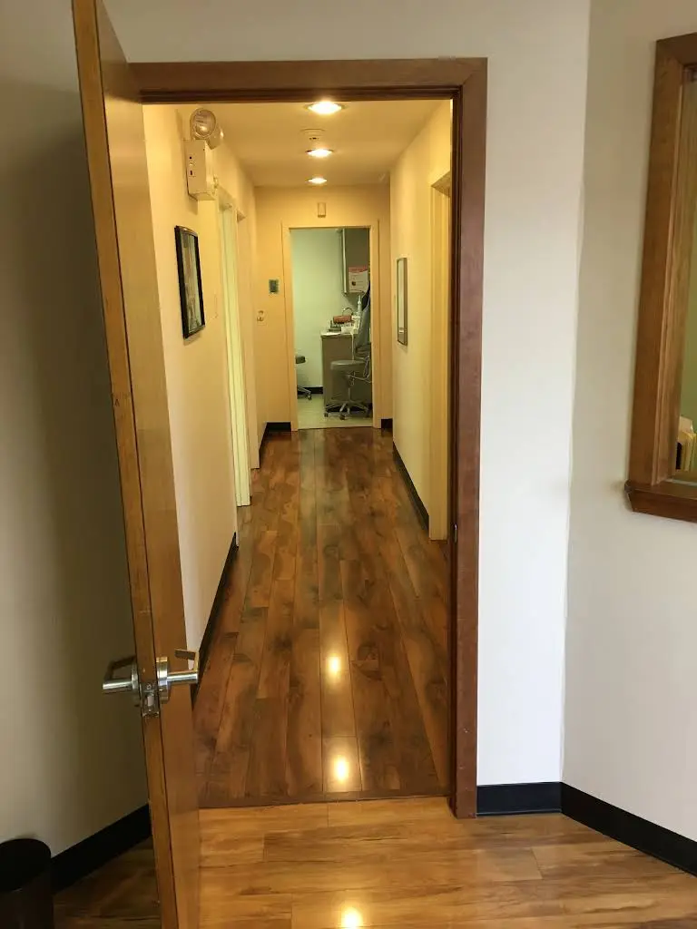 About Smiles, LLC - Professional dental clinic exterior with modern facilities