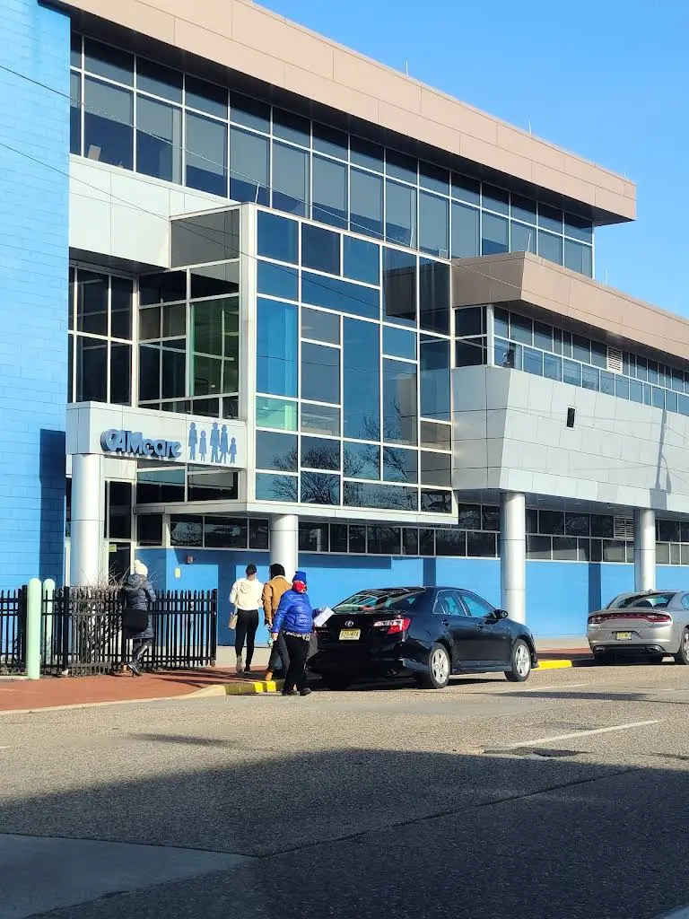 CAMcare Health Corporation - Professional dental clinic exterior with modern facilities