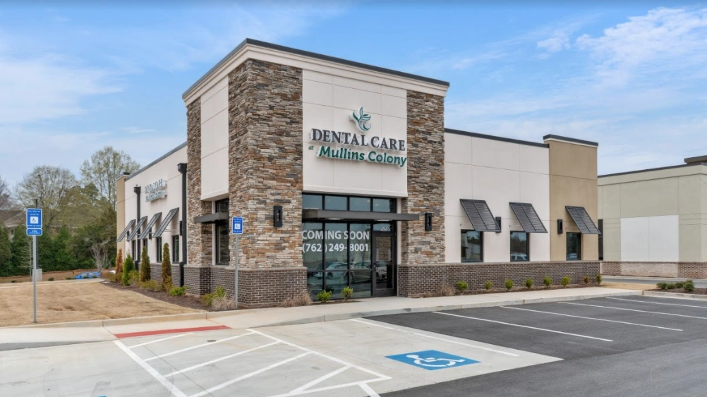 Dental Care at Mullins Colony - Professional dental clinic exterior with modern facilities