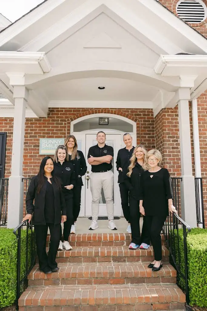 Sunny Smiles Dental Spa - Professional dental clinic exterior with modern facilities