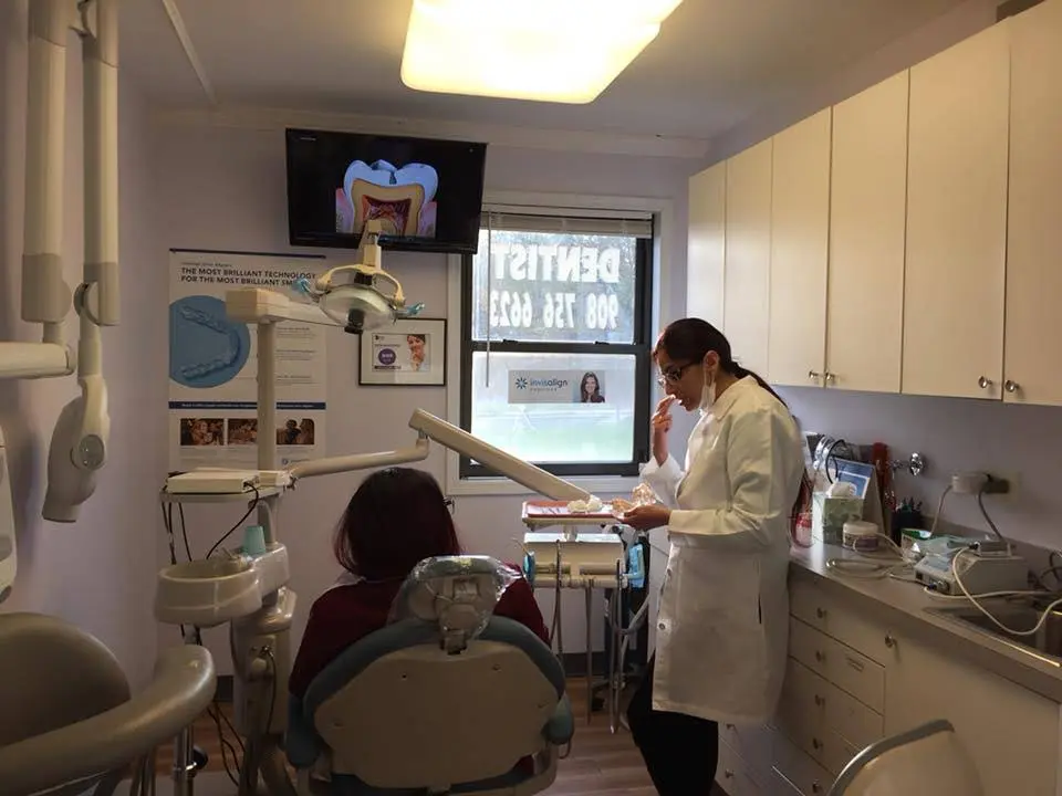 Dental Designer - Professional dental clinic exterior with modern facilities