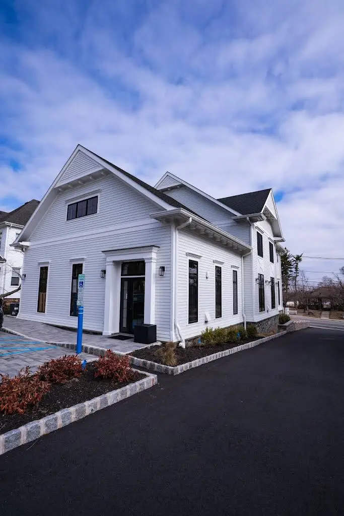 SmilesBySpecialists - Professional dental clinic exterior with modern facilities