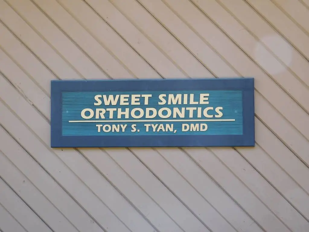 Sweet Smile Orthodontics - Professional dental clinic exterior with modern facilities