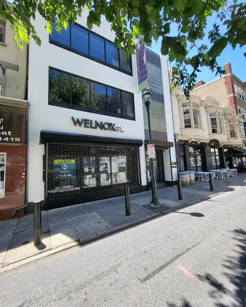 WELNOX Studio - Professional dental clinic exterior with modern facilities