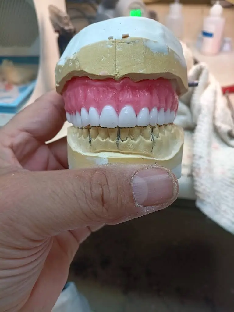 Affordable Dentures & Implants - Professional dental clinic exterior with modern facilities