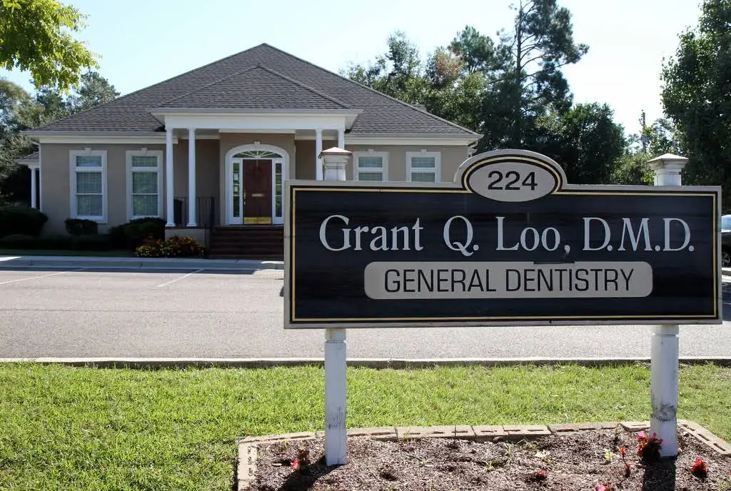 Grant Q. Loo, DMD - Professional dental clinic exterior with modern facilities
