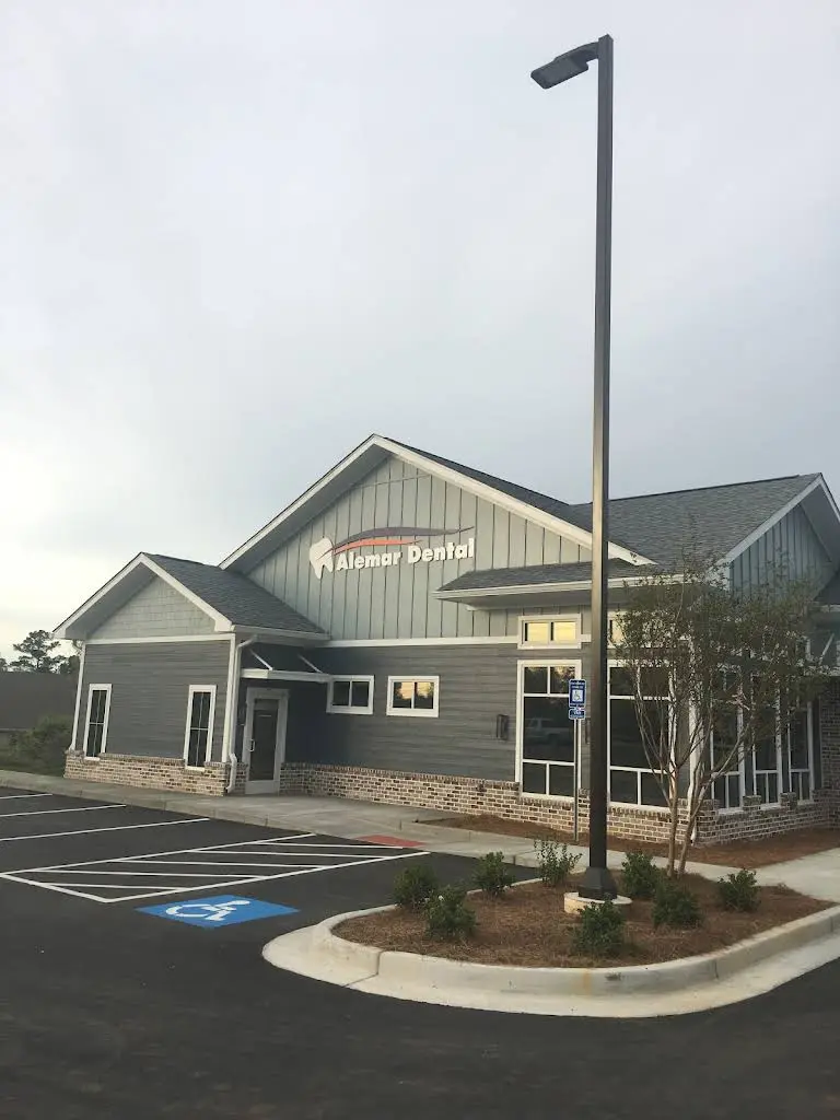 Alemar Dental - Professional dental clinic exterior with modern facilities