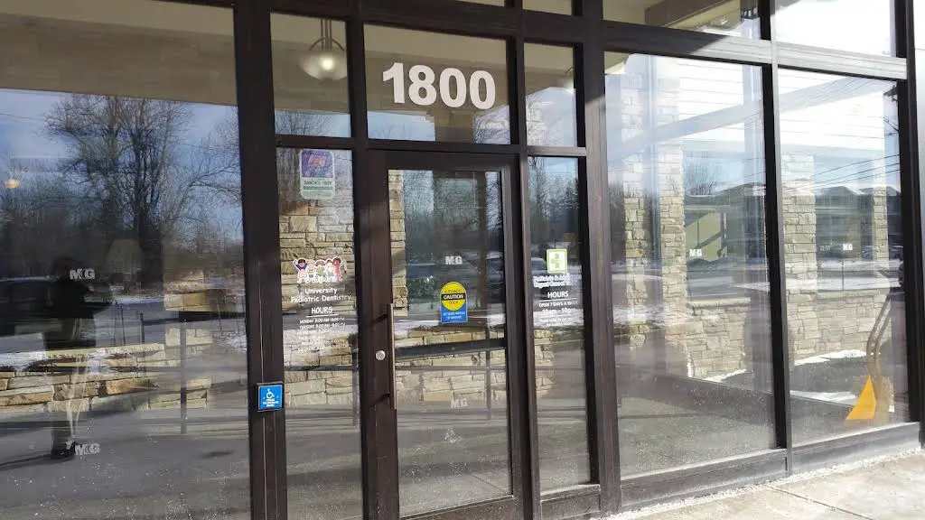 University Pediatric Dentistry - Professional dental clinic exterior with modern facilities