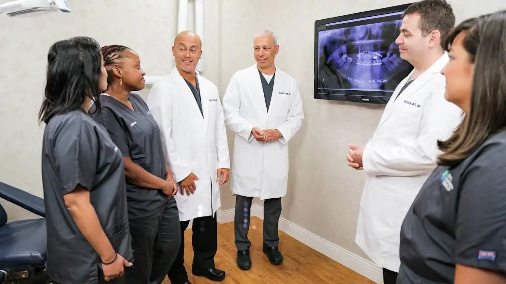Oral Surgery Group, Dental Implants & Wisdom Teeth - Professional dental clinic exterior with modern facilities