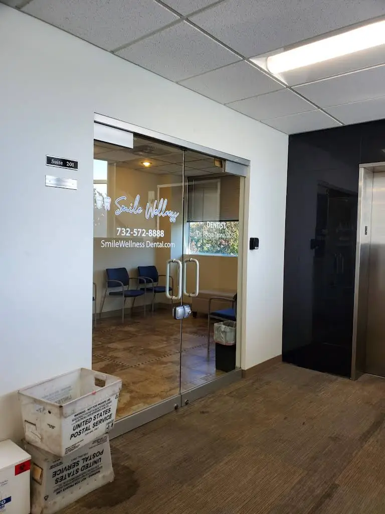 Smile Wellness - Professional dental clinic exterior with modern facilities