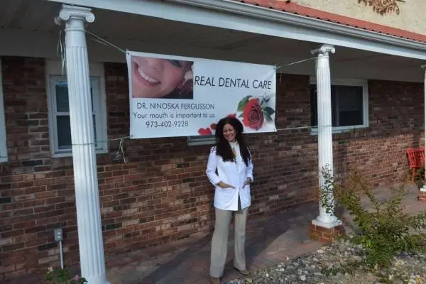 Real Dental Care - Professional dental clinic exterior with modern facilities