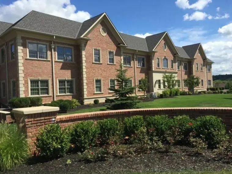 Warren Oral Surgery and Dental Implant Center - Professional dental clinic exterior with modern facilities