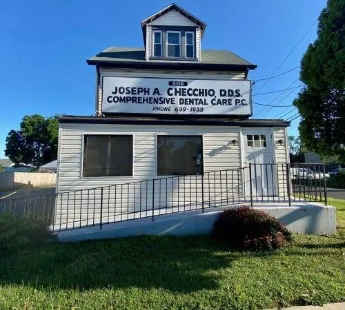 Comprehensive Dental Care - Professional dental clinic exterior with modern facilities