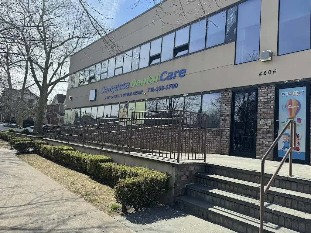 Complete Dental Care - Professional dental clinic exterior with modern facilities
