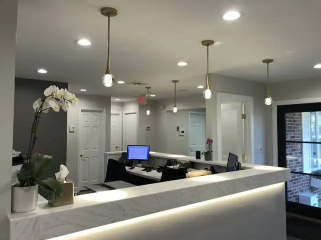 Monroe Smiles - Professional dental clinic exterior with modern facilities
