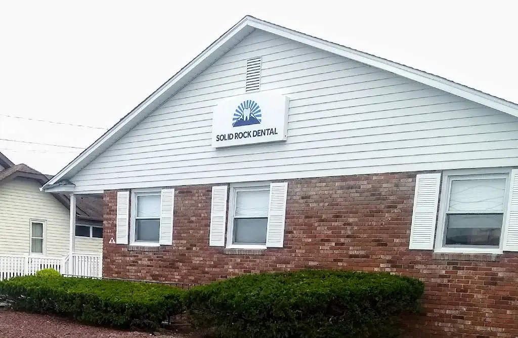 Solid Rock Dental - Professional dental clinic exterior with modern facilities