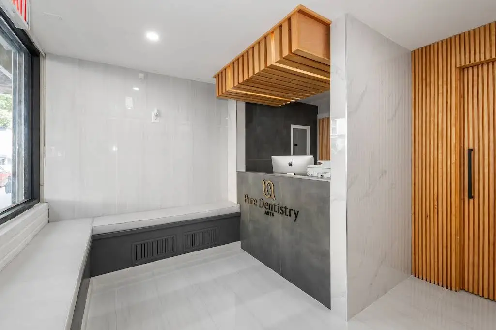 Pure Dentistry Arts - Professional dental clinic exterior with modern facilities