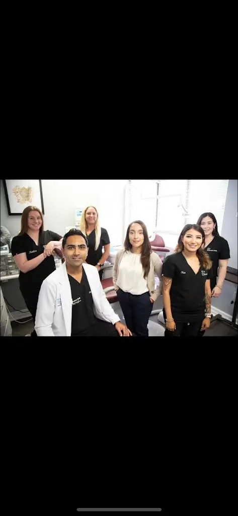 Signature Smiles - Professional dental clinic exterior with modern facilities