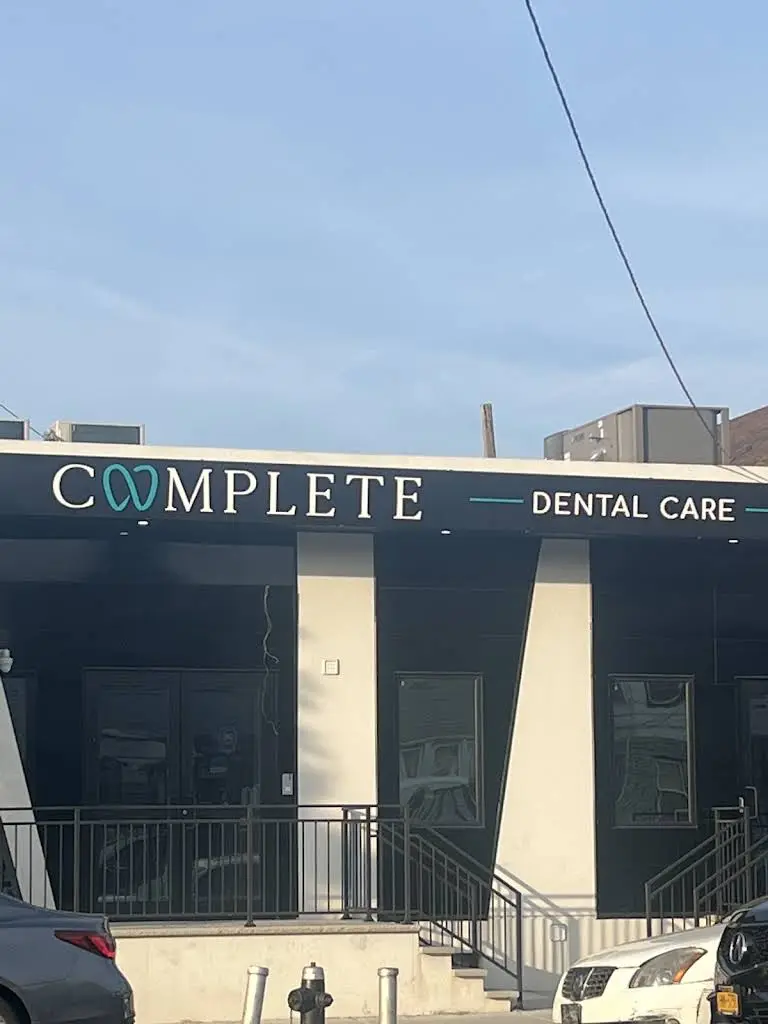 Complete Dental Care - Professional dental clinic exterior with modern facilities