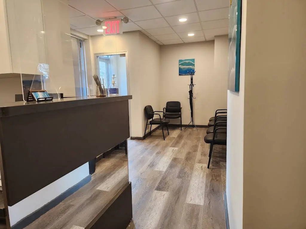 Neptune Dentist - Professional dental clinic exterior with modern facilities