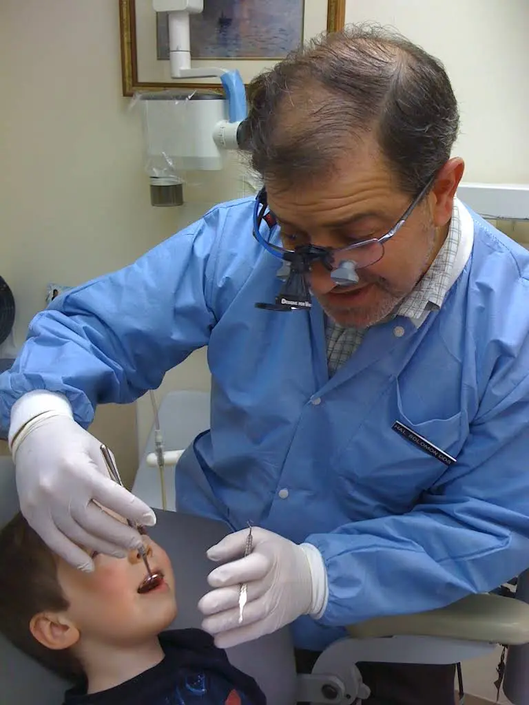 Offices of Dr. Hal Solomon - Professional dental clinic exterior with modern facilities