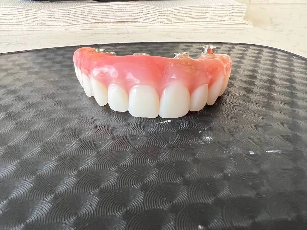 Genuine Smiles - Professional dental clinic exterior with modern facilities