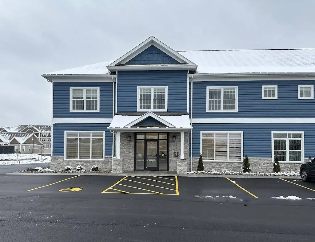 Dental Wellness - Professional dental clinic exterior with modern facilities