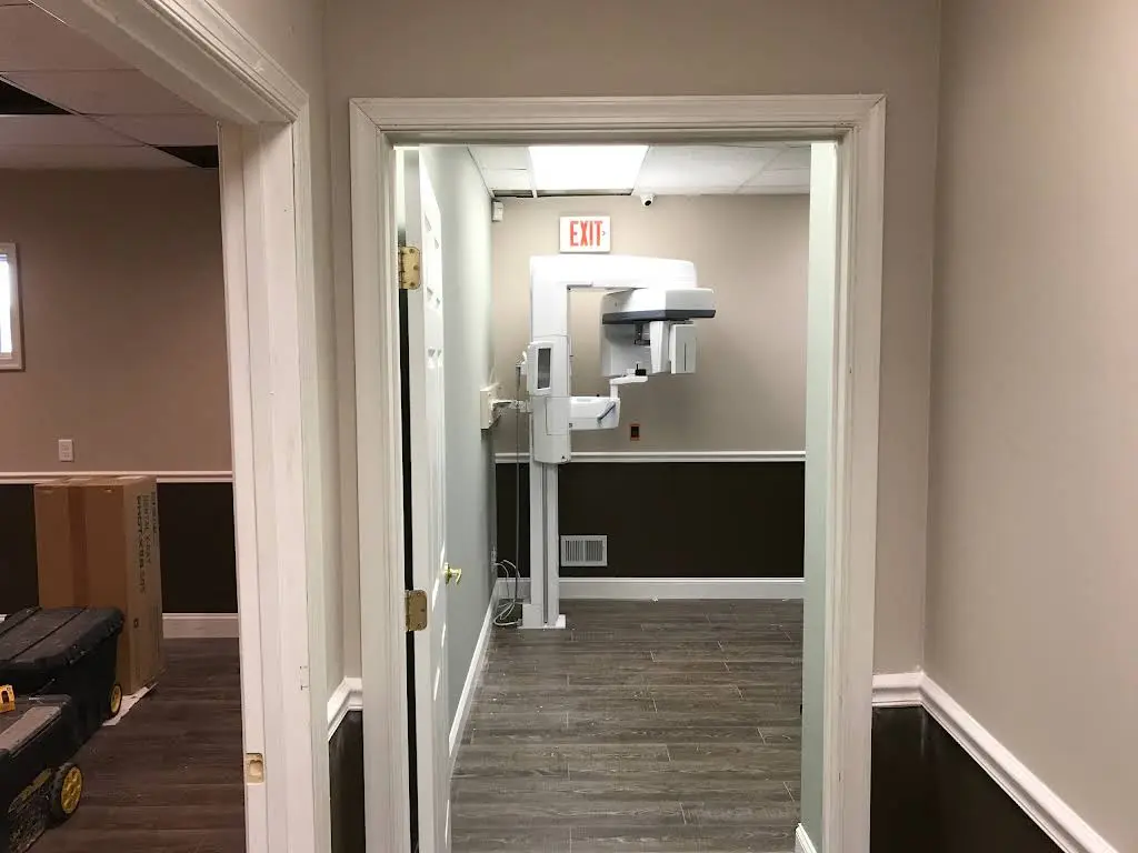 NJ Smiles Dental - Professional dental clinic exterior with modern facilities