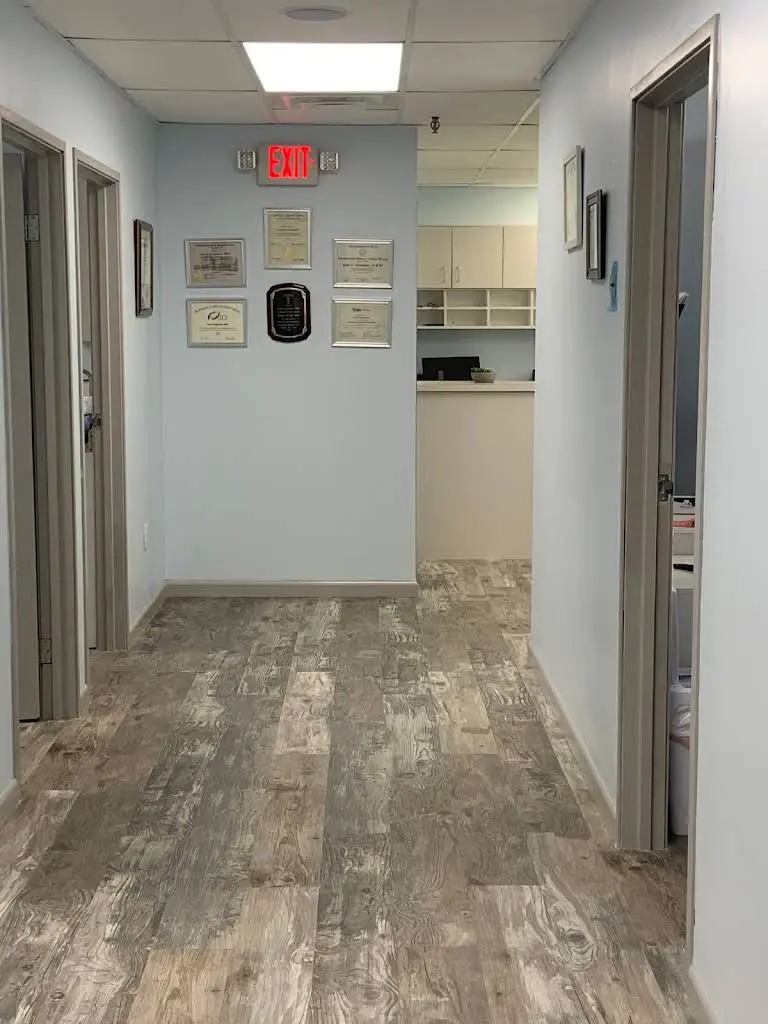 Aesthetic, Implant & Family Dentistry PC - Professional dental clinic exterior with modern facilities