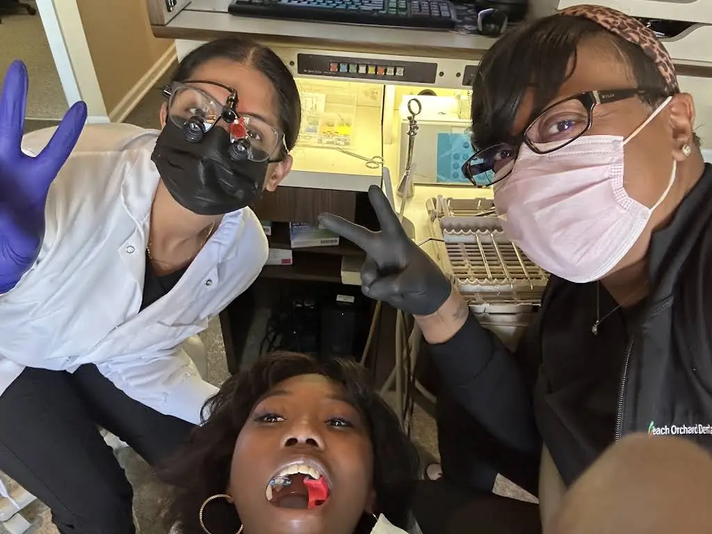 Peach Orchard Dental Care - Professional dental clinic exterior with modern facilities