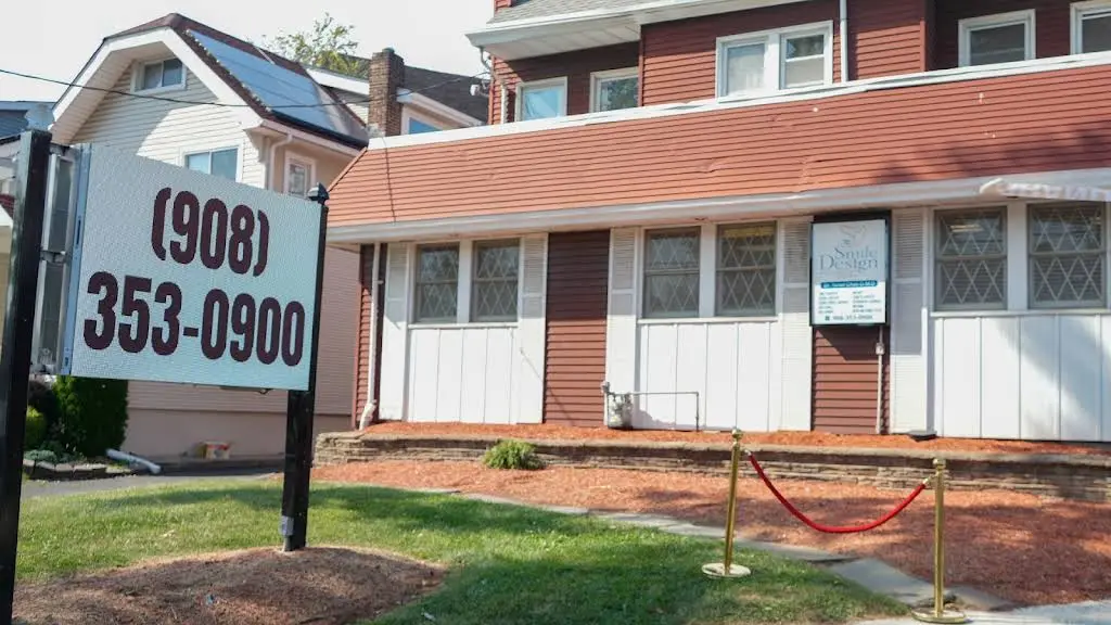 Smile Design and Implant Center - Professional dental clinic exterior with modern facilities
