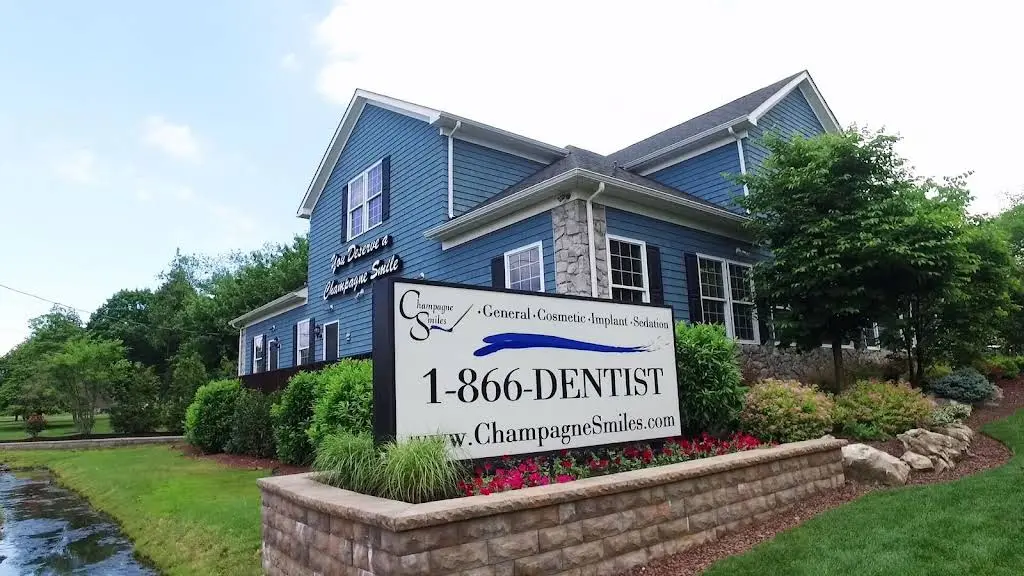 Champagne Smiles - Professional dental clinic exterior with modern facilities