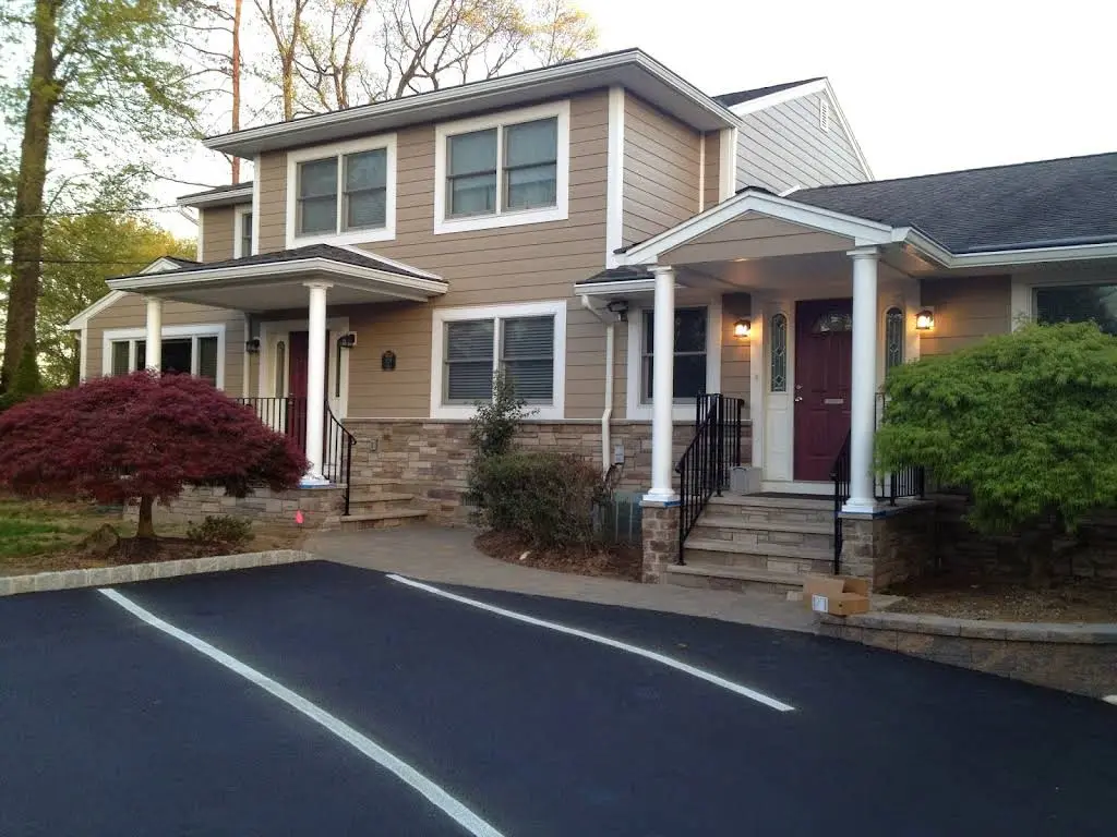 Family and Cosmetic Dentistry - Professional dental clinic exterior with modern facilities
