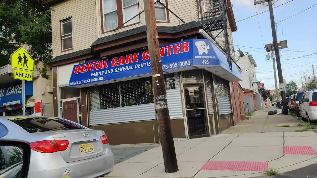 Dental Care Center - Professional dental clinic exterior with modern facilities