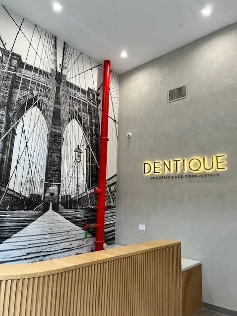 Dumbo Dentique - Professional dental clinic exterior with modern facilities