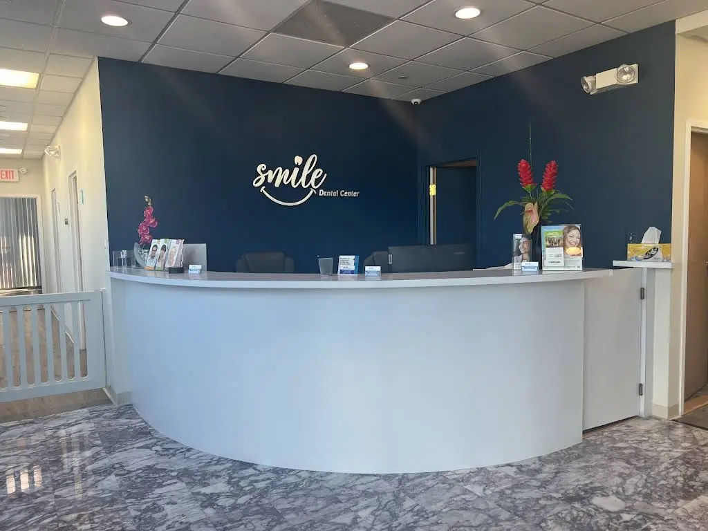 SMILE DENTAL CENTER - Professional dental clinic exterior with modern facilities