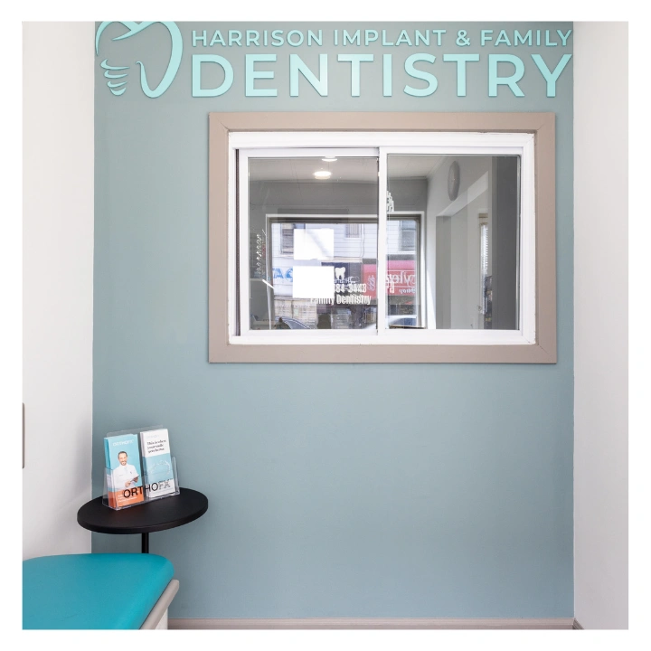 Harrison Implant and Family Dentistry - Professional dental clinic exterior with modern facilities