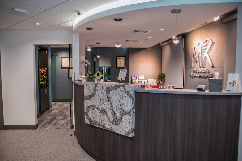 MK Periodontics & Implant Dentistry, PC - Professional dental clinic exterior with modern facilities